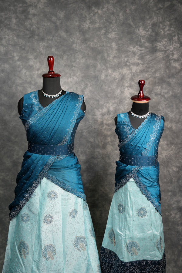Peacock Blue with Aqua Blue Lehenga A beautiful blend of rich peacock blue and soft aqua blue shades with elegant detailing, crafted for a graceful festive and wedding look