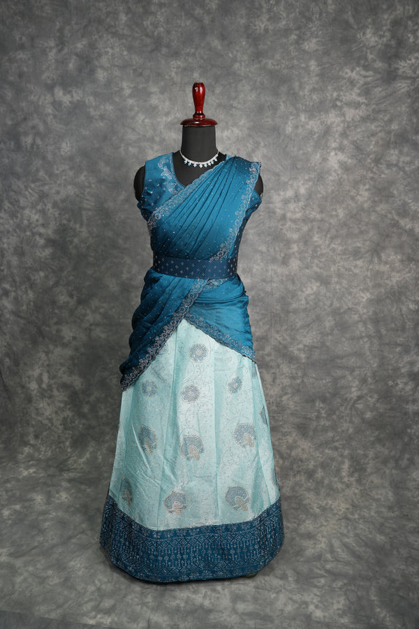Peacock Blue with Aqua Blue Lehenga A beautiful blend of rich peacock blue and soft aqua blue shades with elegant detailing, crafted for a graceful festive and wedding look