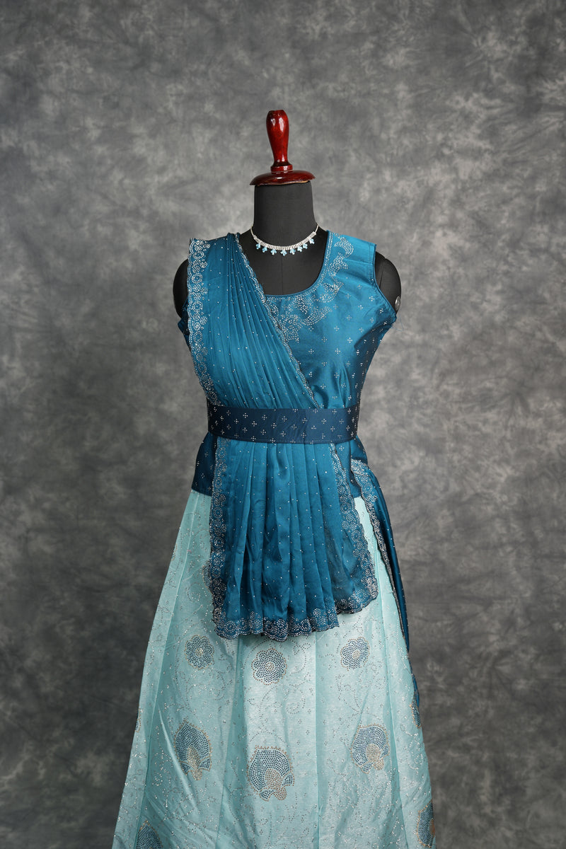 Peacock Blue with Aqua Blue Lehenga A beautiful blend of rich peacock blue and soft aqua blue shades with elegant detailing, crafted for a graceful festive and wedding look
