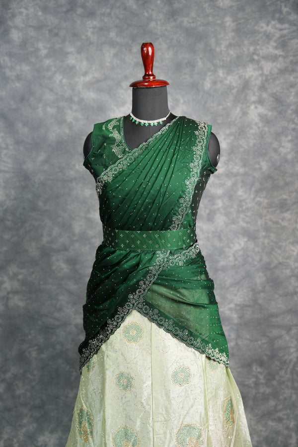 Elegant Green with Dark Green Lehenga featuring rich designer detailing, premium layered drape style, sparkling stone work, graceful festive appearance, stylish traditional outfit for girls, perfect for weddings, receptions & special occasions