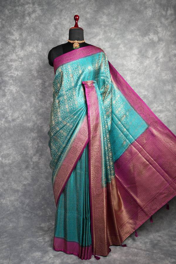 Teal Peacock Banarasi Silk Saree with Magenta Border & Rich Antique Gold Zari Weave – Elegant Pallu with Intricate Brocade Work, Paired with Matching Blouse | Perfect for Weddings & Festive Occasions