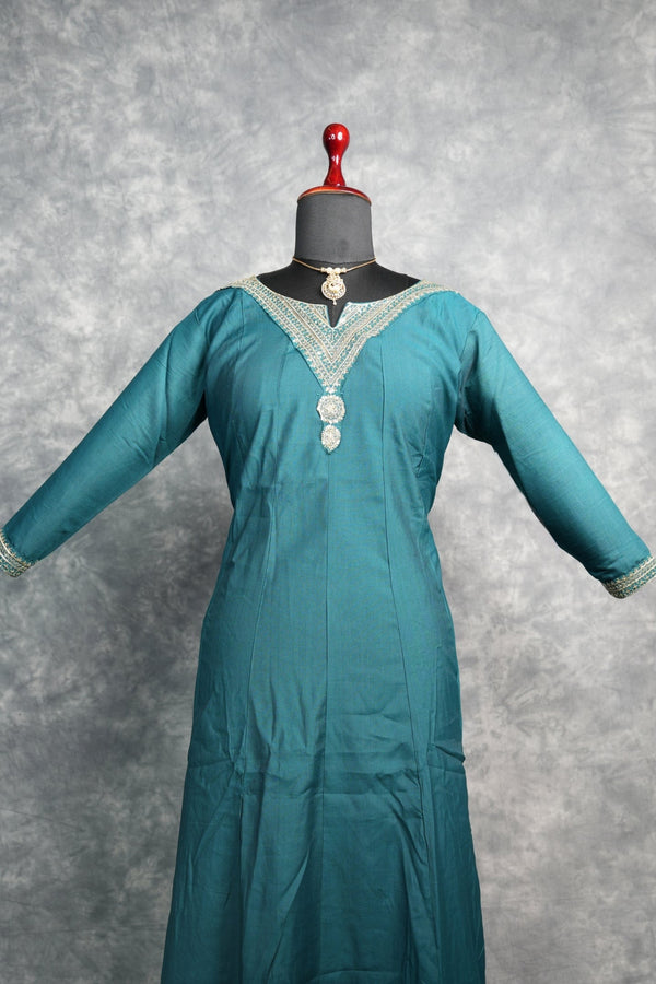 Deep Teal Anarkali Churidar Set - Stunning deep teal silk anarkali with gold zari embroidery, sequin work & rich embellished borders. A graceful, festive pick for weddings & celebrations.