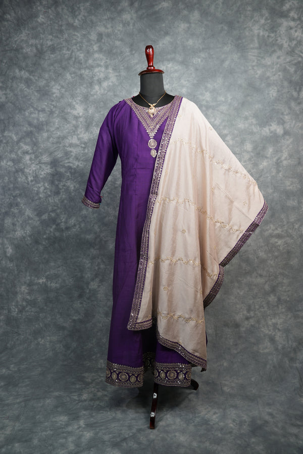 Royal Purple Anarkali Chudi Set - Luxurious deep purple silk anarkali with intricate gold embroidery, mirror work & ornate borders. A stunning, regal pick for weddings & ethnic styled looks.