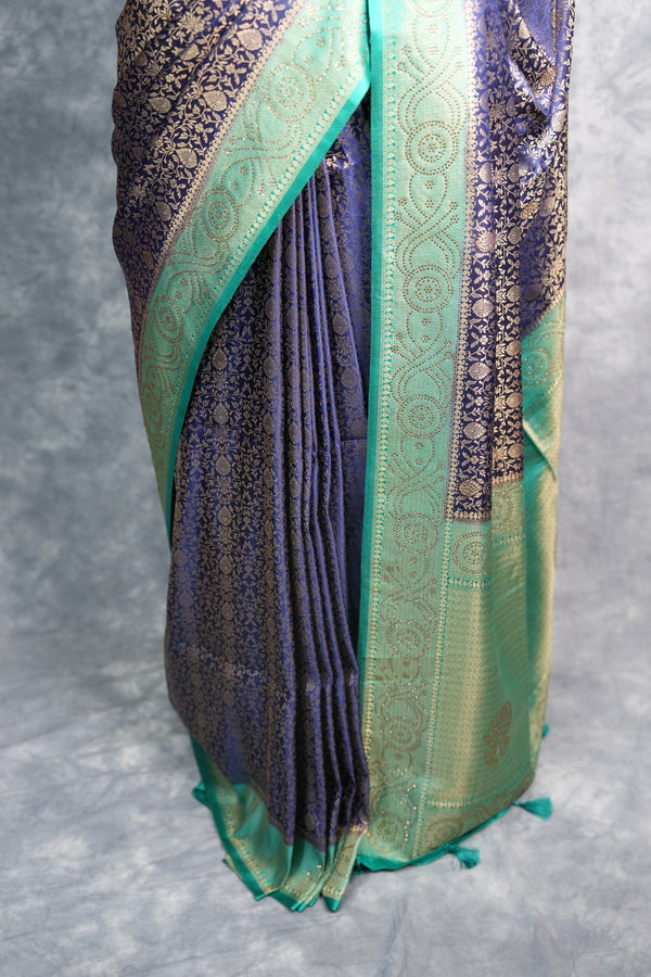 Navy Blue Banarasi Silk Saree with Teal Turquoise Border & Antique Gold Zari Weave – All-Over Floral Brocade Body, Heavy Designer Pallu & Matching Blouse Ideal for Grand Occasions & Traditional Gatherings