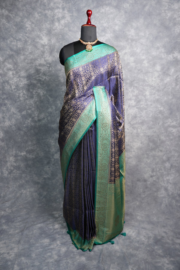 Navy Blue Banarasi Silk Saree with Teal Turquoise Border & Antique Gold Zari Weave – All-Over Floral Brocade Body, Heavy Designer Pallu & Matching Blouse Ideal for Grand Occasions & Traditional Gatherings