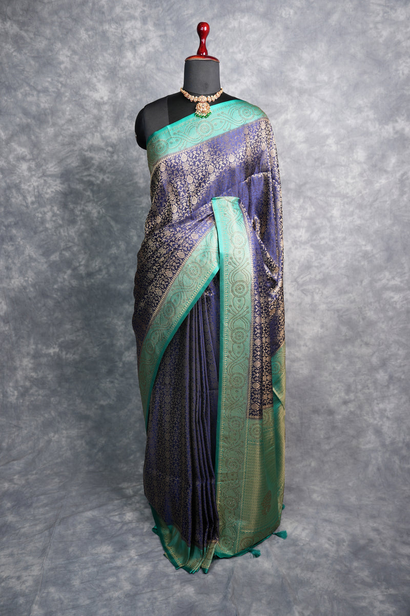 Navy Blue Banarasi Silk Saree with Teal Turquoise Border & Antique Gold Zari Weave – All-Over Floral Brocade Body, Heavy Designer Pallu & Matching Blouse Ideal for Grand Occasions & Traditional Gatherings