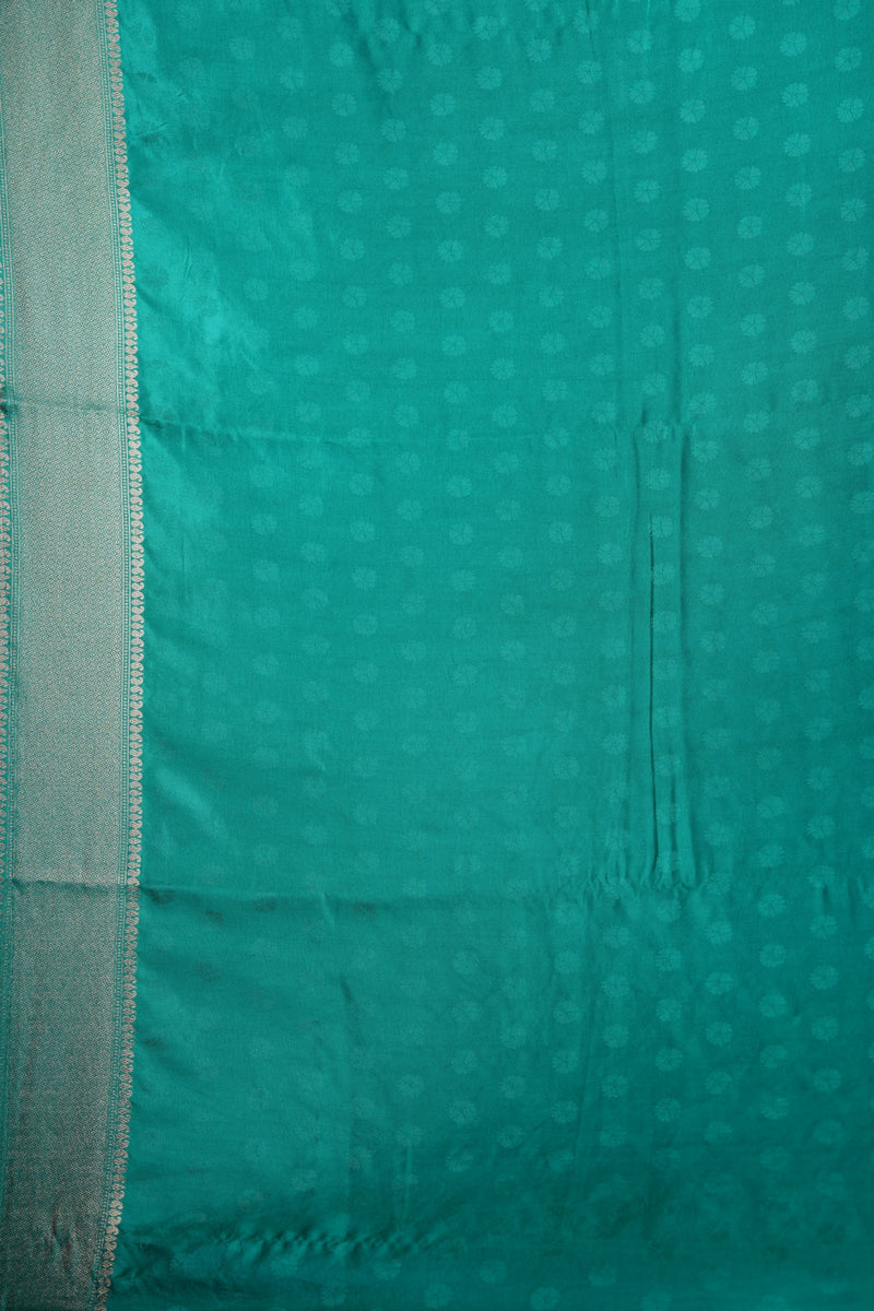 Navy Blue Banarasi Silk Saree with Teal Turquoise Border & Antique Gold Zari Weave – All-Over Floral Brocade Body, Heavy Designer Pallu & Matching Blouse Ideal for Grand Occasions & Traditional Gatherings