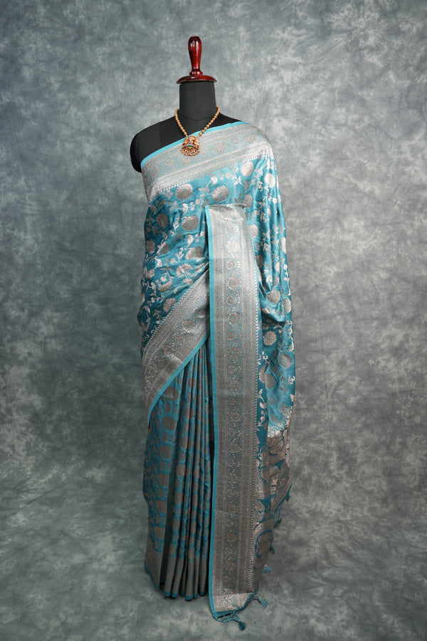Traditional Japanese kimono with a blue pattern on a gray background
