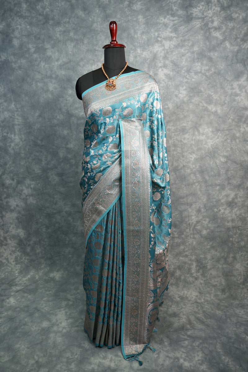 Traditional Japanese kimono with a blue pattern on a gray background