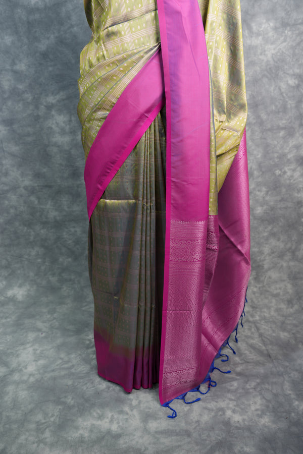 Sari with pink border on a gray background
