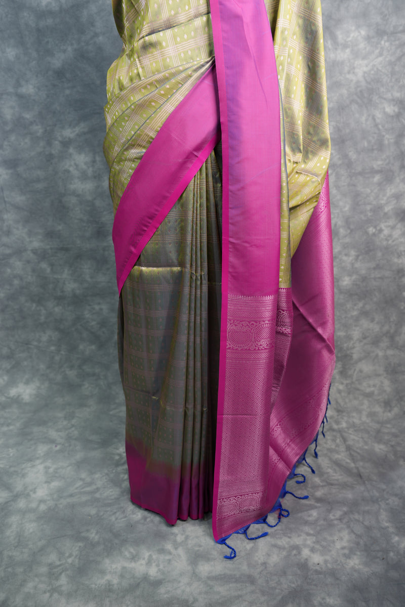 Sari with pink border on a gray background