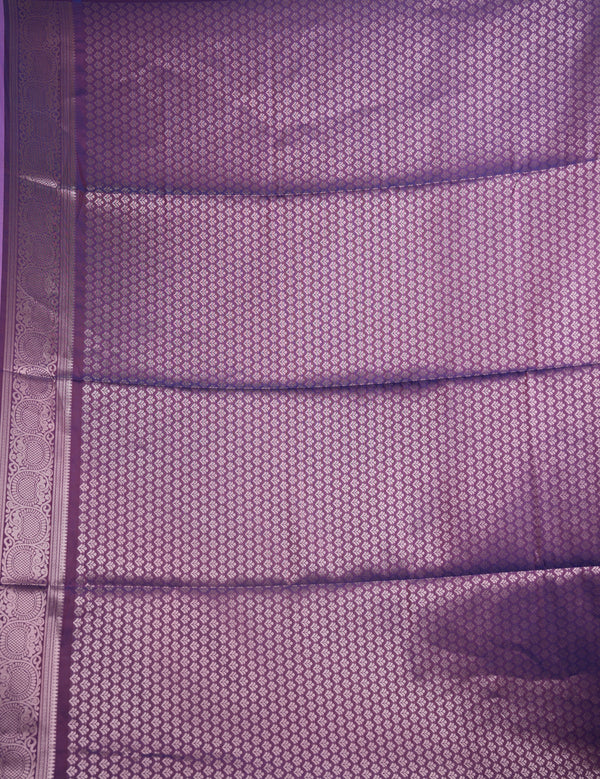 Lavender & Deep Purple Soft Silk Saree Silver Zari Check Weave & Small Buttas Body Broad Dark Purple Zari Border Intricate Temple Pallu Design Blue Tassel Finish Bridal & Festive Wear