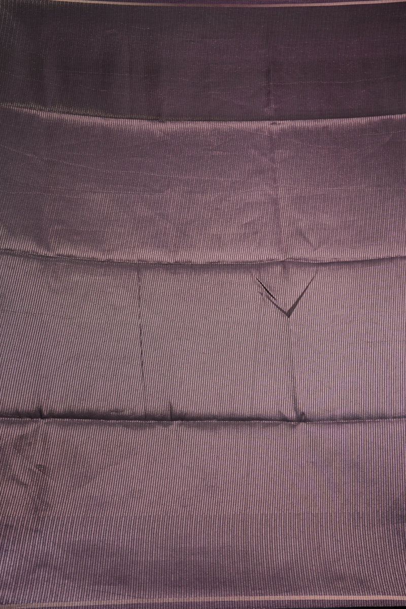 Close-up of a textured purple fabric with a subtle pattern