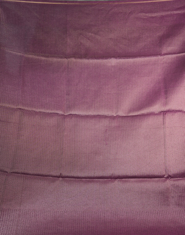 Close-up of a purple textured fabric surface