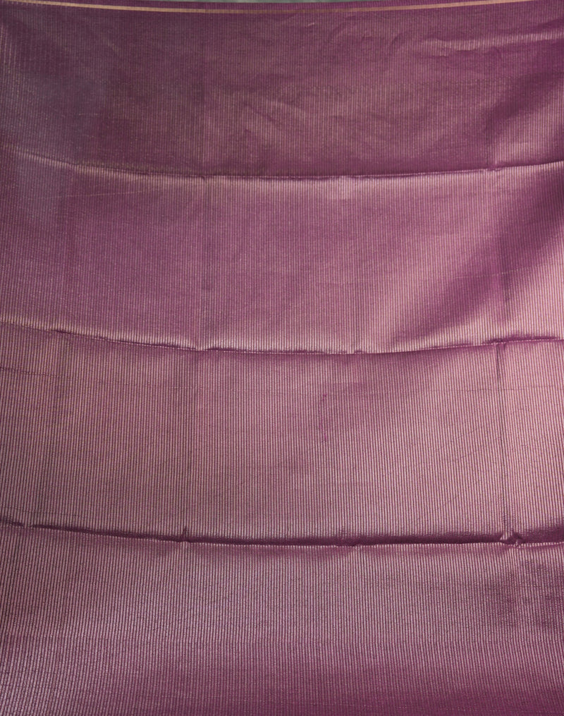 Close-up of a purple textured fabric surface