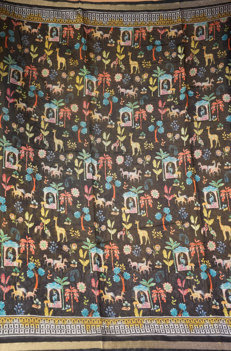 A dark brown fabric panel featuring a dense, colorful folk-art style print of animals, flowers, palm trees, and small arch motifs, finished with a decorative patterned border at the top and bottom.