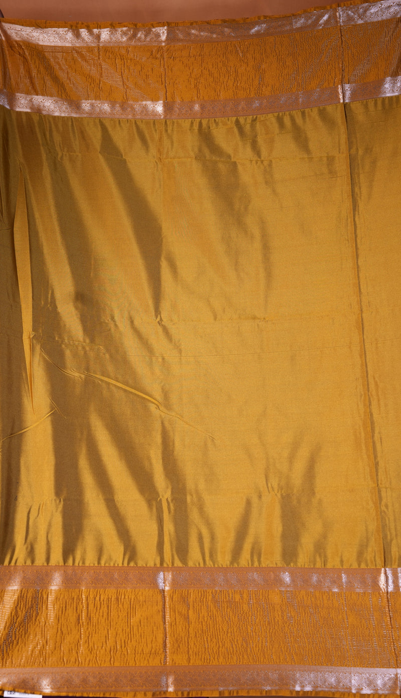 A mustard yellow fabric curtain or drape with metallic silver borders at the top and bottom, shown hanging flat.
