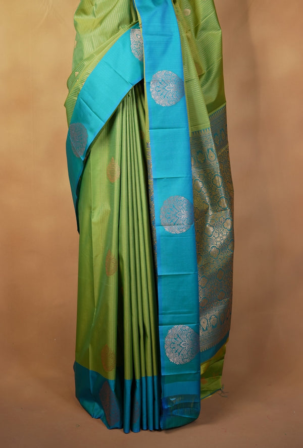 Moss Green Soft Silk Saree | Teal Zari Medallion Border | Festive & Traditional Wear