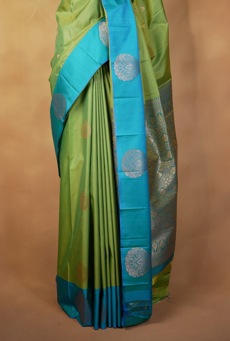 Moss Green Soft Silk Saree | Teal Zari Medallion Border | Festive & Traditional Wear