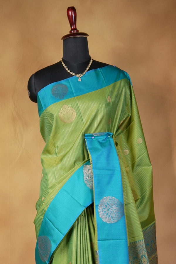 Moss Green Soft Silk Saree | Teal Zari Medallion Border | Festive & Traditional Wear