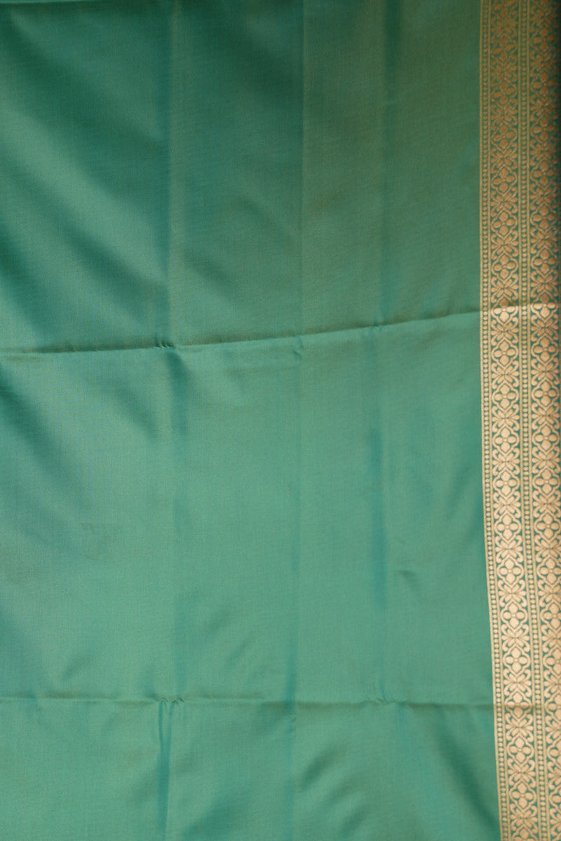 Olive Green Soft Silk Saree | Teal Zari Medallion Border | Traditional Wear