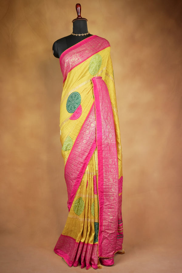 Yellow Bandhani Crush Saree with Pink Zari Border, Bandhej Print Silk Blend Saree with Tassels