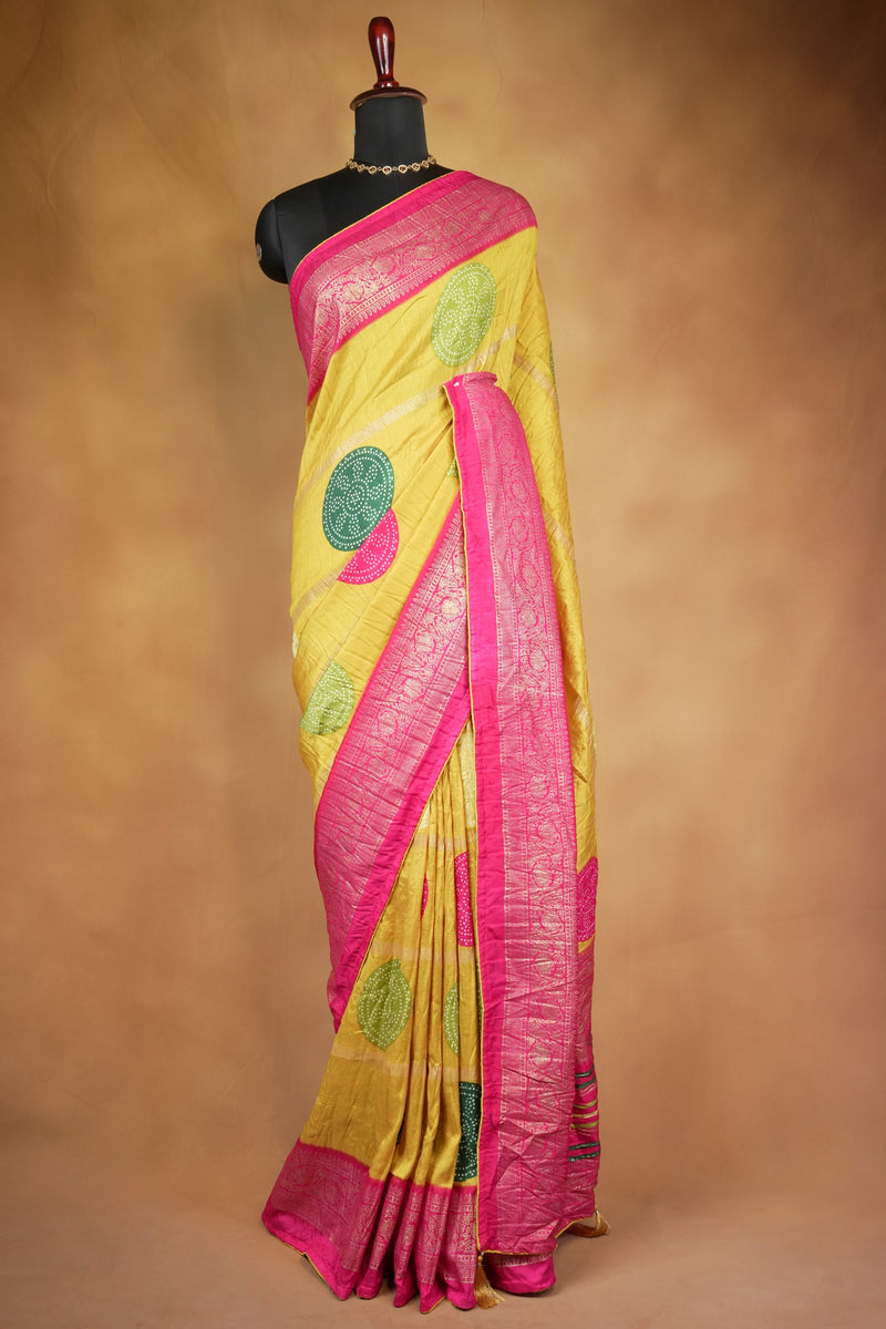 Yellow Bandhani Crush Saree with Pink Zari Border, Bandhej Print Silk Blend Saree with Tassels