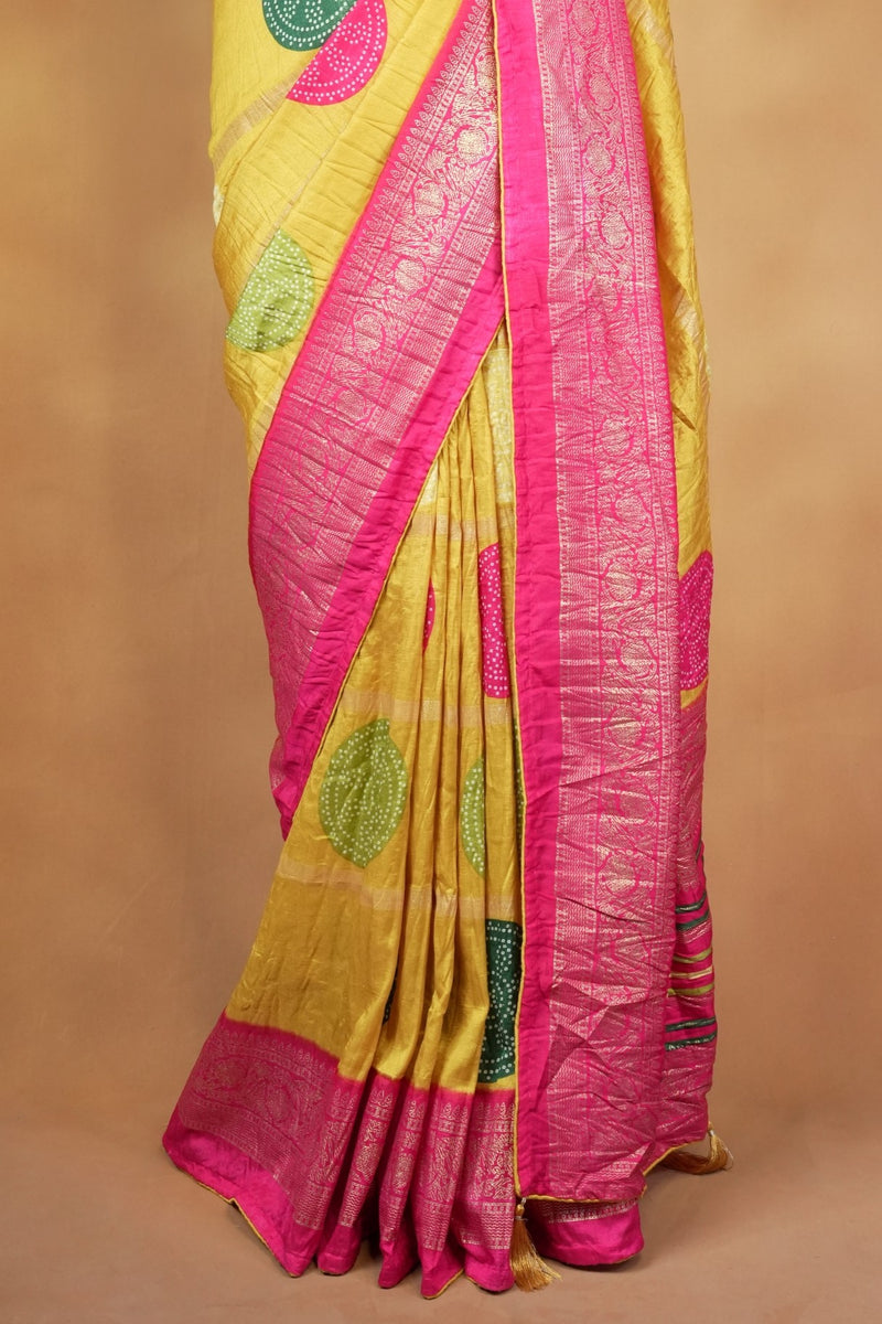 Yellow Bandhani Crush Saree with Pink Zari Border, Bandhej Print Silk Blend Saree with Tassels