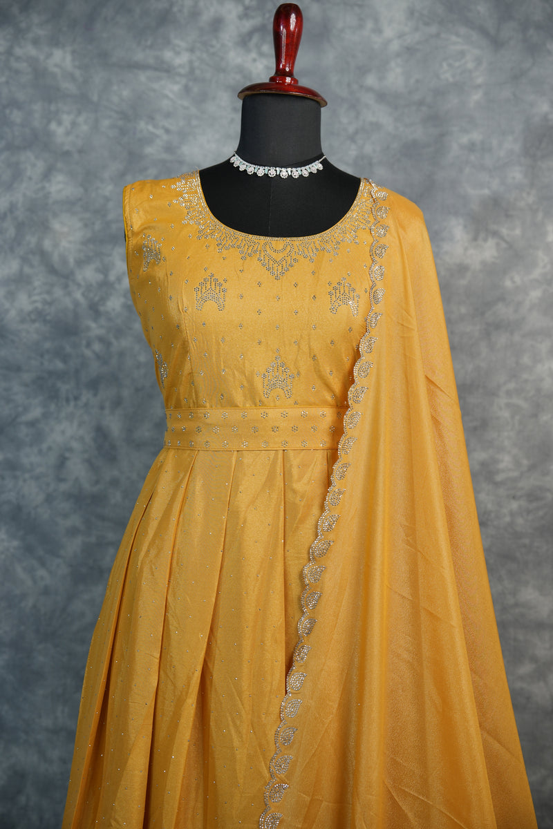 Yellow Chiffon Stone Chudi Maxi Set - A radiant yellow chiffon maxi set adorned with delicate stone detailing that adds a subtle sparkle. Designed with a graceful flow and lightweight comfort, it offers an elegant.