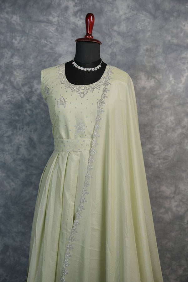 Mint Cream Stone Chudi Maxi Set – A graceful blend of mint and cream tones, beautifully highlighted with delicate stone detailing. Designed for a refined and elegant look, this maxi set offers a flattering silhouette with a touch of subtle sparkle.