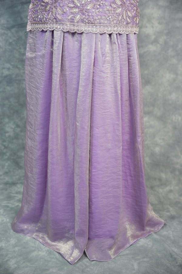 Purple Sharara Set for Girls Elegant Ethnic Wear Crafted in Soft Premium Fabric, Featuring Beautiful Floral Embroidery, Flowy Flared Design, and Matching Stylish Top Perfect for Festive Occasions.