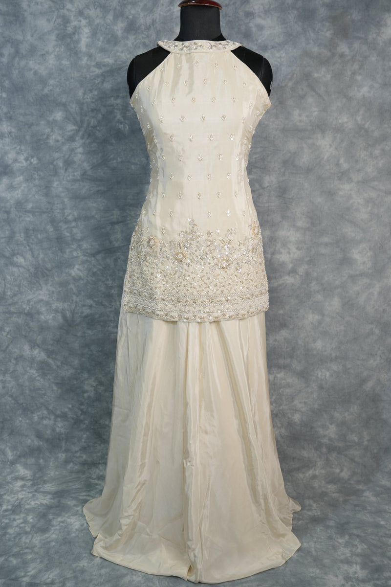 Elegant Ivory Cream Girls Sharara Set Crafted in Soft Premium Fabric with Delicate Floral Embroidery, Flared Design & Matching Top A Graceful Ethnic Wear Outfit for Festive Celebrations