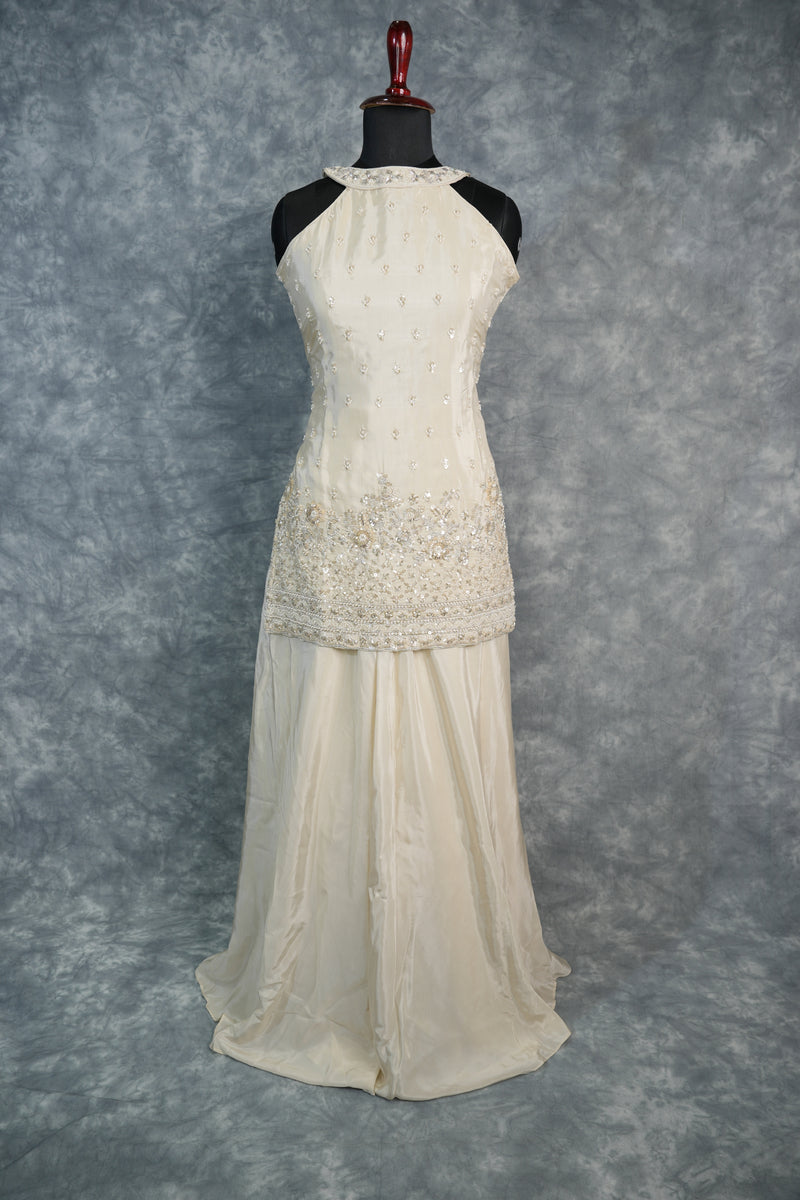 Elegant Ivory Cream Girls Sharara Set Crafted in Soft Premium Fabric with Delicate Floral Embroidery, Flared Design & Matching Top A Graceful Ethnic Wear Outfit for Festive Celebrations