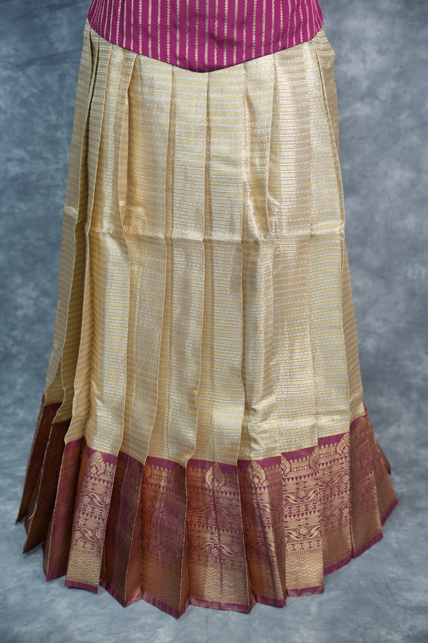 Wine Pattu Pavadai Set for Girls, Designed with Elegant Traditional Woven Patterns on the Skirt, Enhanced by Rich Golden Border Accents, and Paired with a Stylish Contrast Blouse for Festive & Wedding Wear