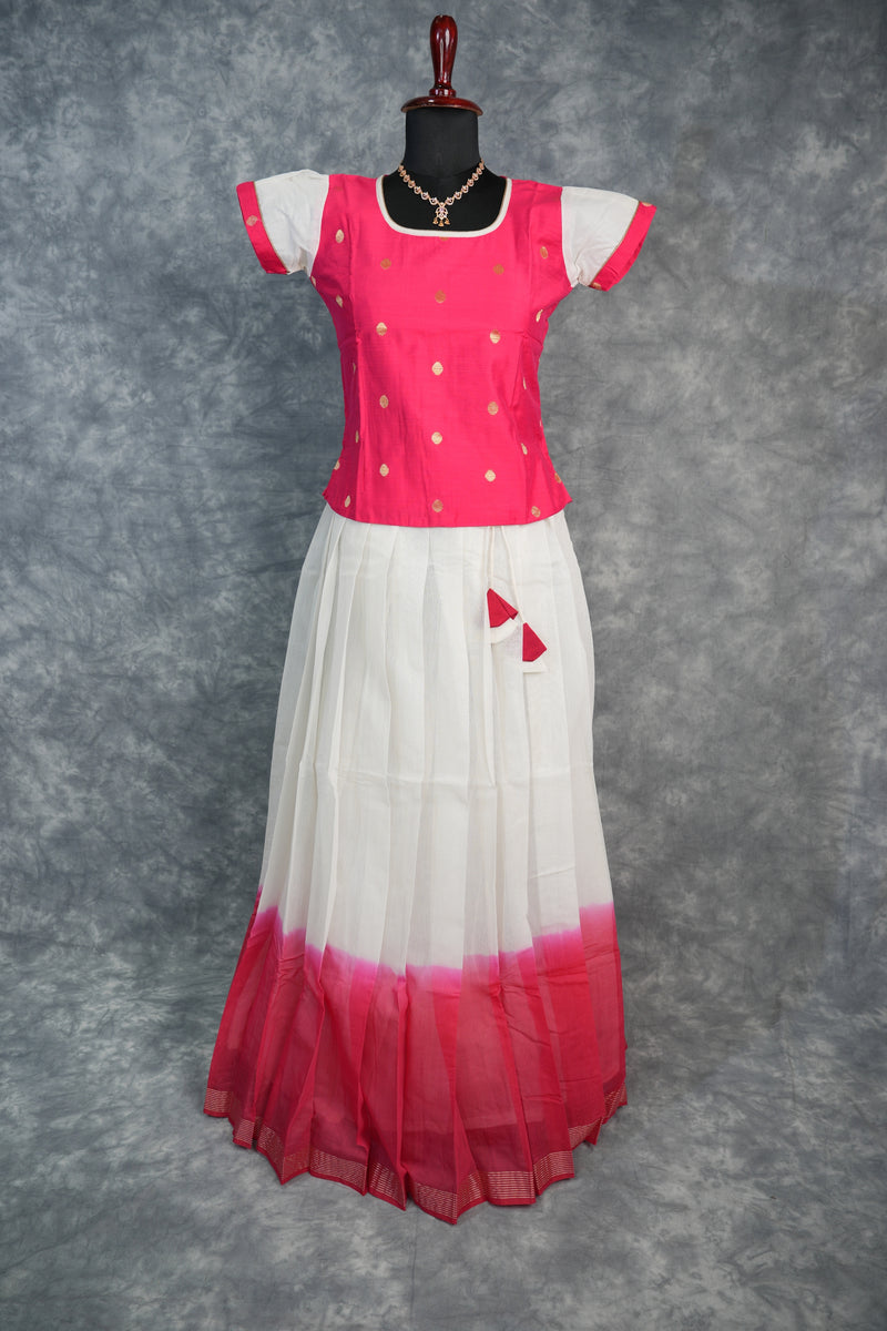 Red and white dress with a pattern on a gray background