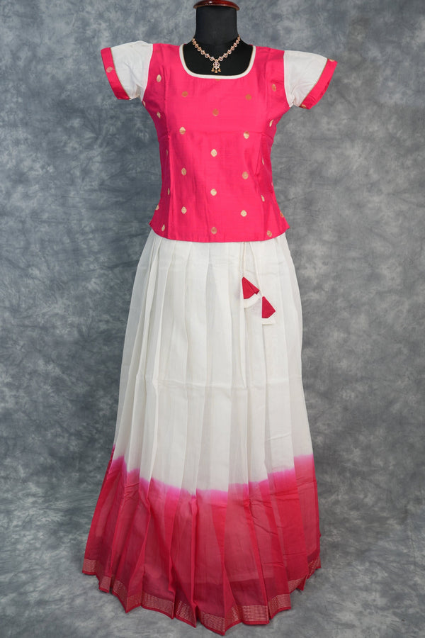 Red and white dress with a pattern on a gray background