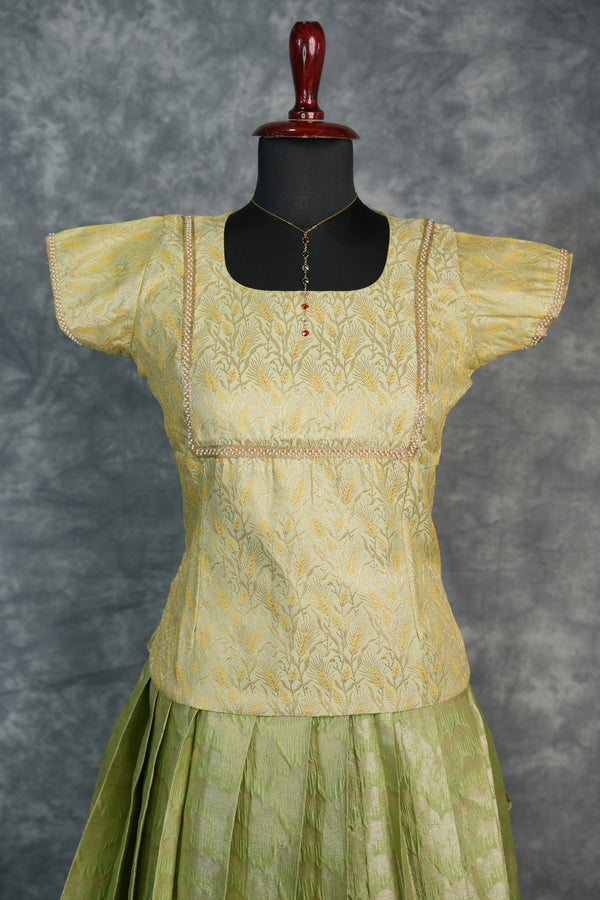 Pista Green Pattu Pavadai with Traditional Golden Zari Borders, Soft Premium Silk Finish & Elegant Ethnic Look – Perfect Festive, Wedding & Grand Occasion Outfit with Comfortable Lehenga Pattern