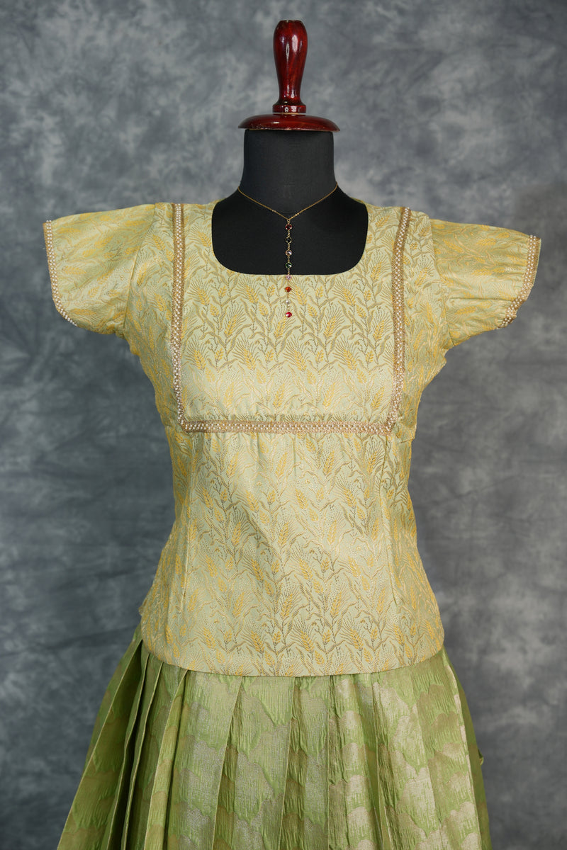 Pista Green Pattu Pavadai with Traditional Golden Zari Borders, Soft Premium Silk Finish & Elegant Ethnic Look – Perfect Festive, Wedding & Grand Occasion Outfit with Comfortable Lehenga Pattern