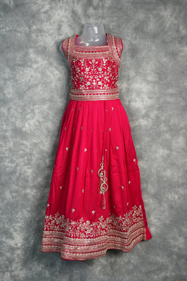 Rani Pink Girls Midi A charming rani pink midi dress designed with a graceful silhouette and elegant detailing. Perfect for festive occasions, parties, and stylish ethnic wear looks.