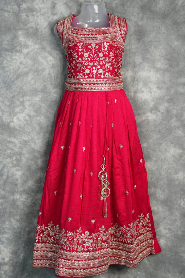 Rani Pink Girls Midi A charming rani pink midi dress designed with a graceful silhouette and elegant detailing. Perfect for festive occasions, parties, and stylish ethnic wear looks.