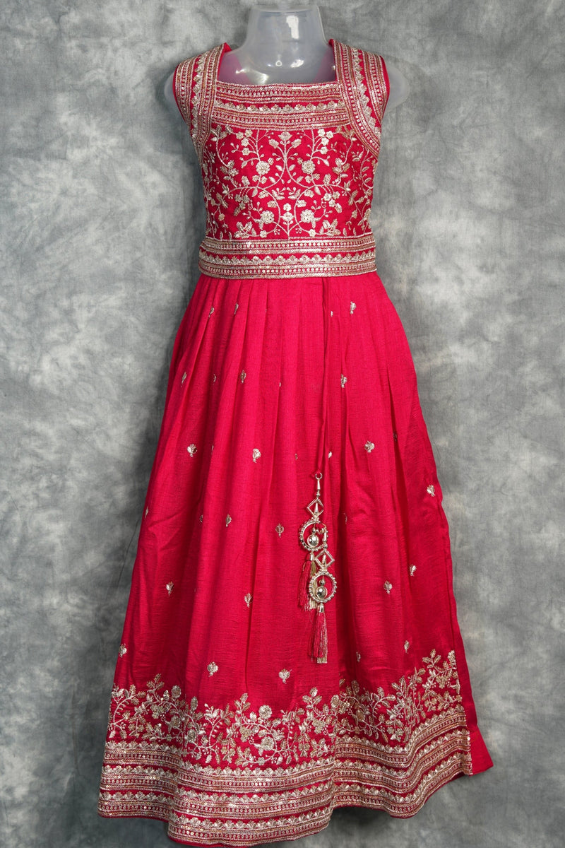 Rani Pink Girls Midi A charming rani pink midi dress designed with a graceful silhouette and elegant detailing. Perfect for festive occasions, parties, and stylish ethnic wear looks.