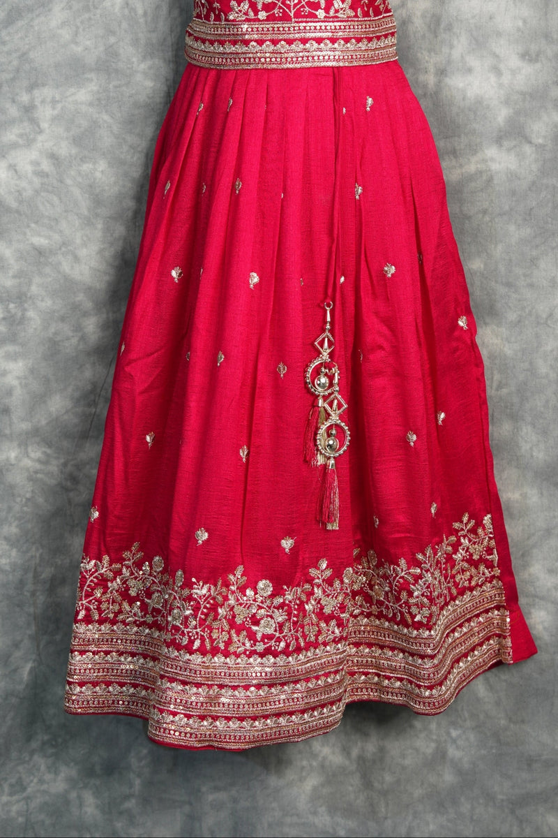 Rani Pink Girls Midi A charming rani pink midi dress designed with a graceful silhouette and elegant detailing. Perfect for festive occasions, parties, and stylish ethnic wear looks.