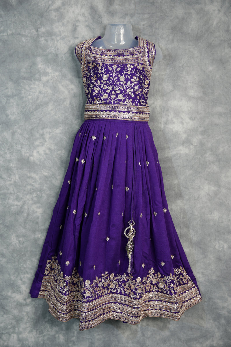 Royal Purple Girls Midi – A charming purple midi dress designed with elegant detailing and a graceful silhouette. Crafted for stylish comfort, this outfit brings a perfect blend of festive charm and modern elegance for girls.