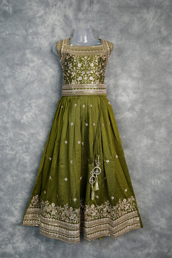Olive Green Girls Midi – A charming green midi dress designed with a graceful silhouette and stylish detailing. Crafted for comfort and elegance, perfect for festive occasions and trendy ethnic styling.