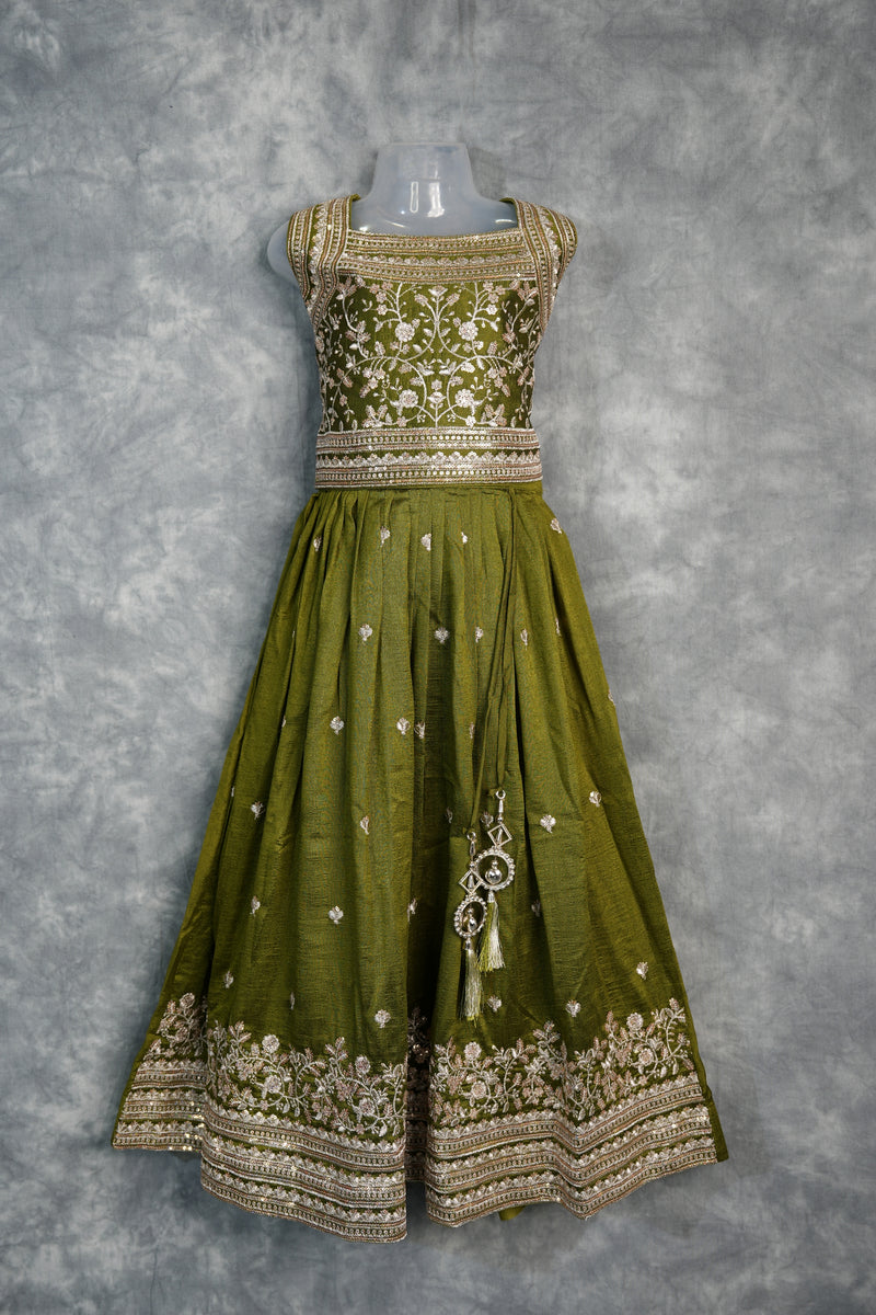 Olive Green Girls Midi – A charming green midi dress designed with a graceful silhouette and stylish detailing. Crafted for comfort and elegance, perfect for festive occasions and trendy ethnic styling.