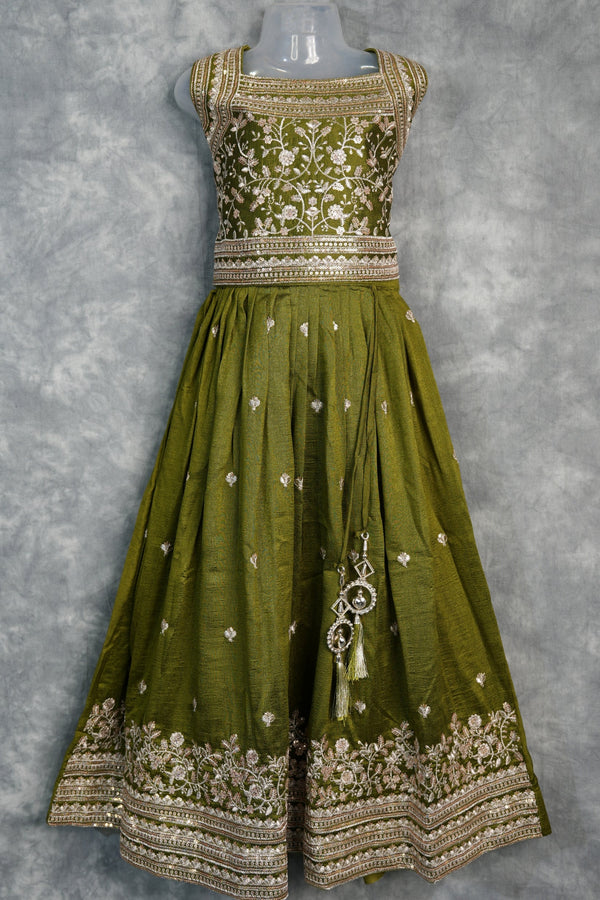 Olive Green Girls Midi – A charming green midi dress designed with a graceful silhouette and stylish detailing. Crafted for comfort and elegance, perfect for festive occasions and trendy ethnic styling.