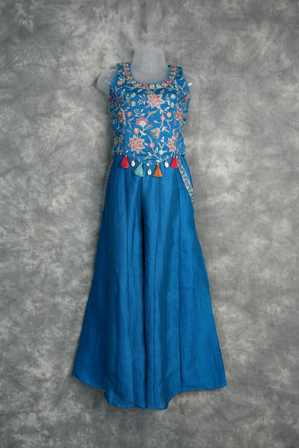 Teal Blue Girls Floral Embroidered Palazzo Set Ethnic Fusion Party Wear with Multicolor Threadwork, Tassel & Cowrie Shell Details for Kids