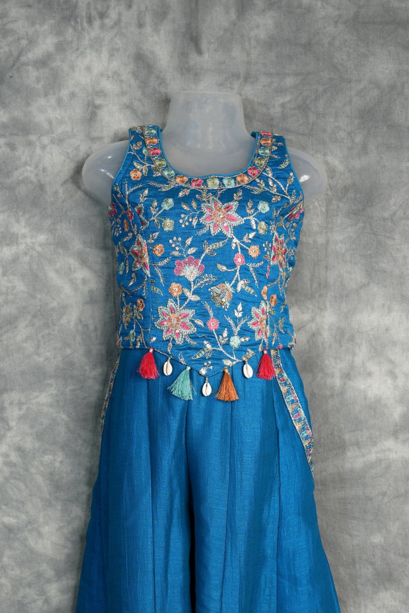 Teal Blue Girls Floral Embroidered Palazzo Set Ethnic Fusion Party Wear with Multicolor Threadwork, Tassel & Cowrie Shell Details for Kids