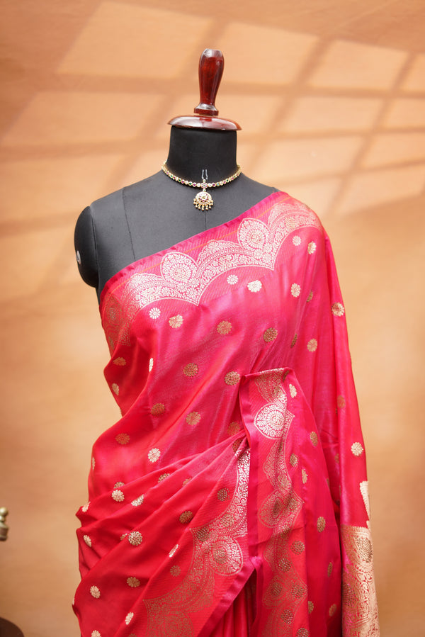 Red Banarasi Saree - A classic red Banarasi saree that showcases a rich and timeless colour appeal, with designer border that enhance the look and rich look pallu makes the saree rich paired with a matching blouse.