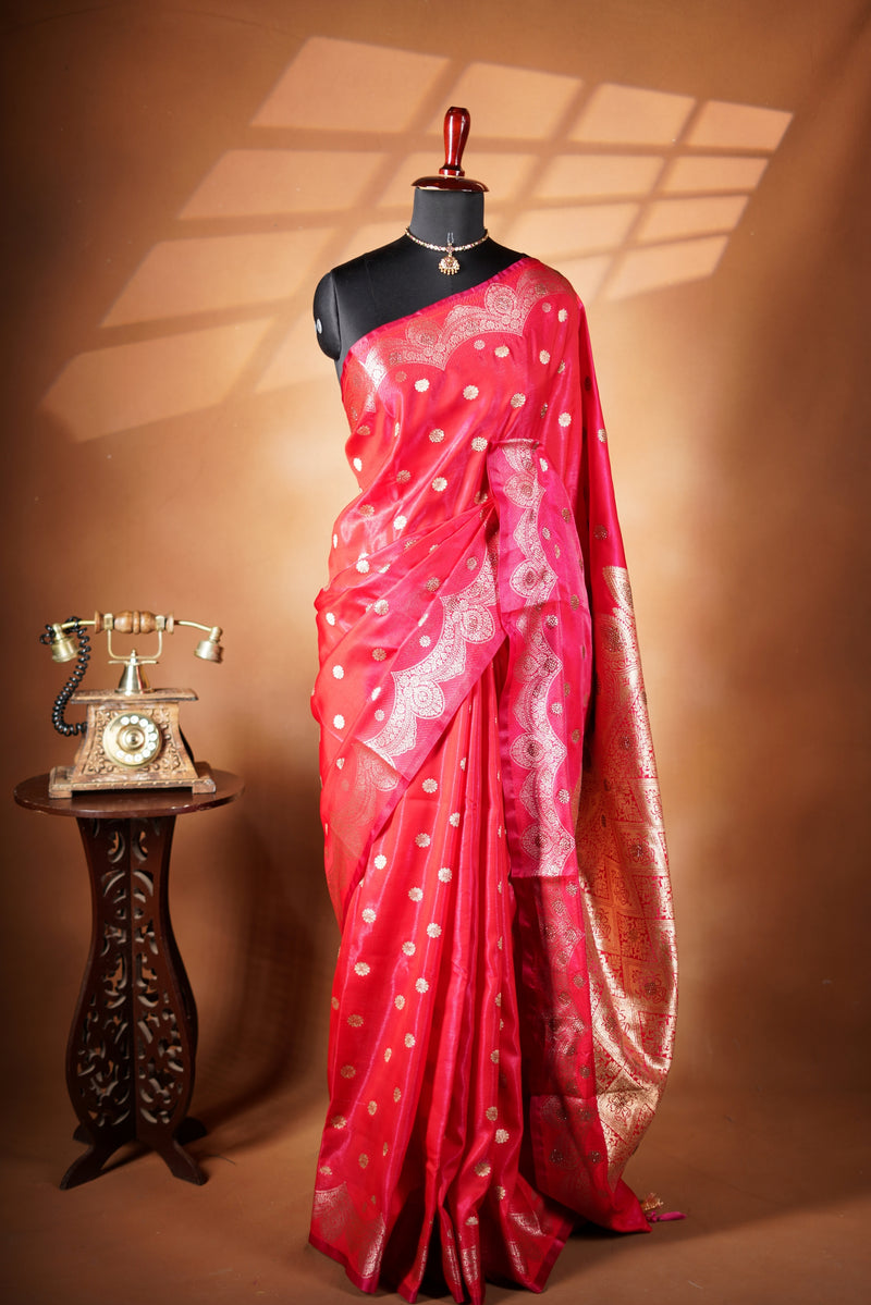 Red Banarasi Saree - A classic red Banarasi saree that showcases a rich and timeless colour appeal, with designer border that enhance the look and rich look pallu makes the saree rich paired with a matching blouse.